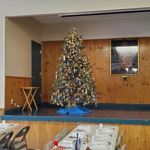 Nordahl Hall photo Lutefisk Dinner Christmas Tree and stage 2023